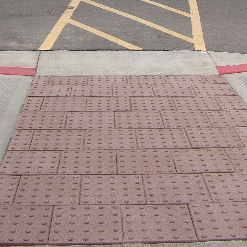 Wausau Tile official product image | Truncated Dome ADA Paver | source https://wausautile.com/media/products/DomePaver_1.jpg