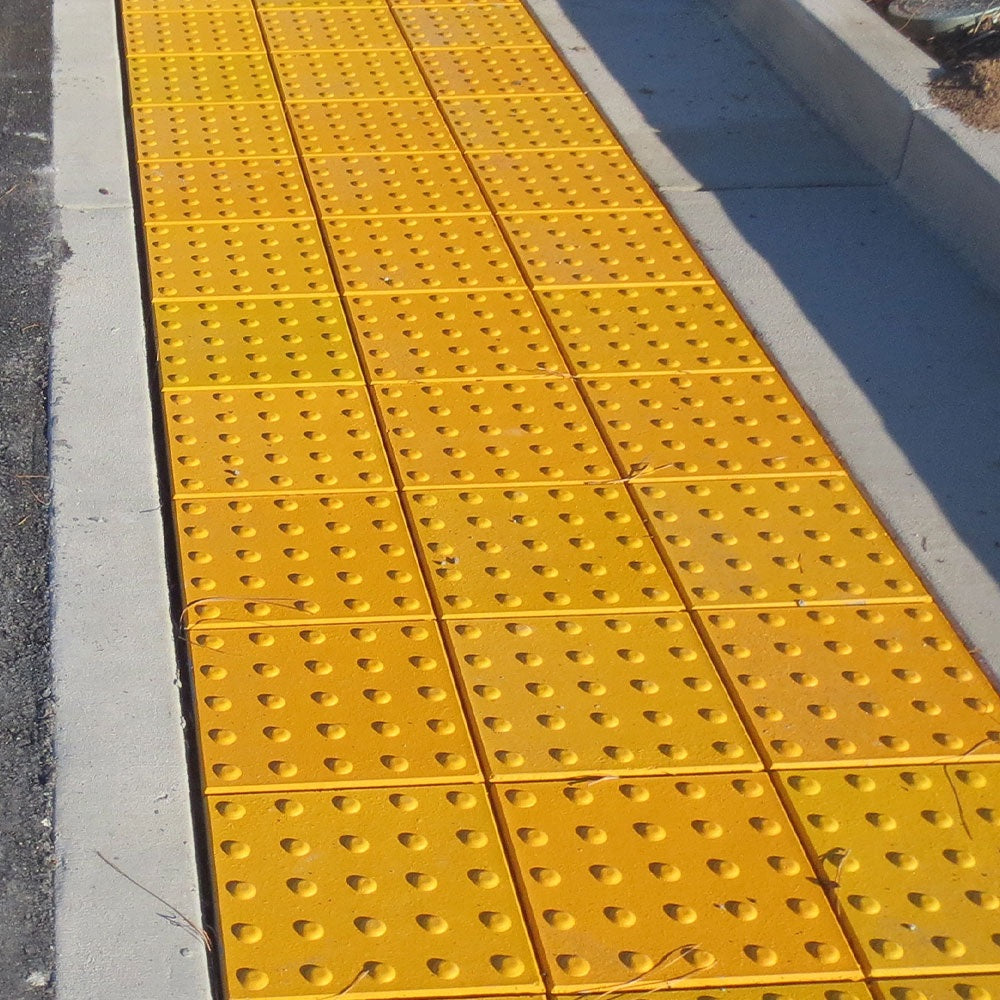 Wausau Tile official product image | Truncated Dome ADA Paver | source https://wausautile.com/media/products/DomePaver_2.jpg