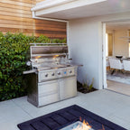 https://cdn.shopify.com/s/files/1/0338/9934/8108/products/freestanding-estate-gas-grill-outdoor-backyard-lifestyle.jpg?v=1745980941