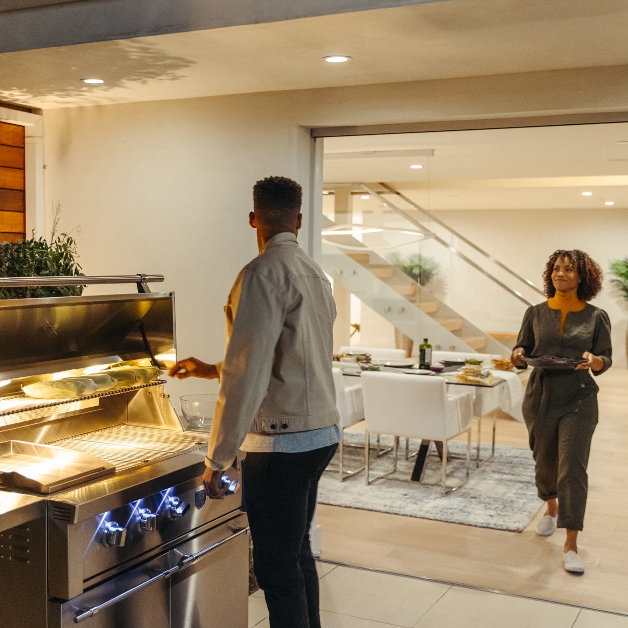https://cdn.shopify.com/s/files/1/0338/9934/8108/products/freestanding-estate-gas-grill-outdoor-couple-lifestyle_ad9ae105-f185-4217-8df7-c7c7d80939ca.jpg?v=1745980941